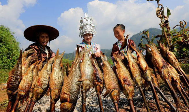 Miao ethnic group celebrate harvest in S China's Guangxi